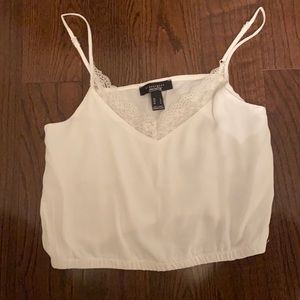 White cropped tank in size women’s large from S.W.S
